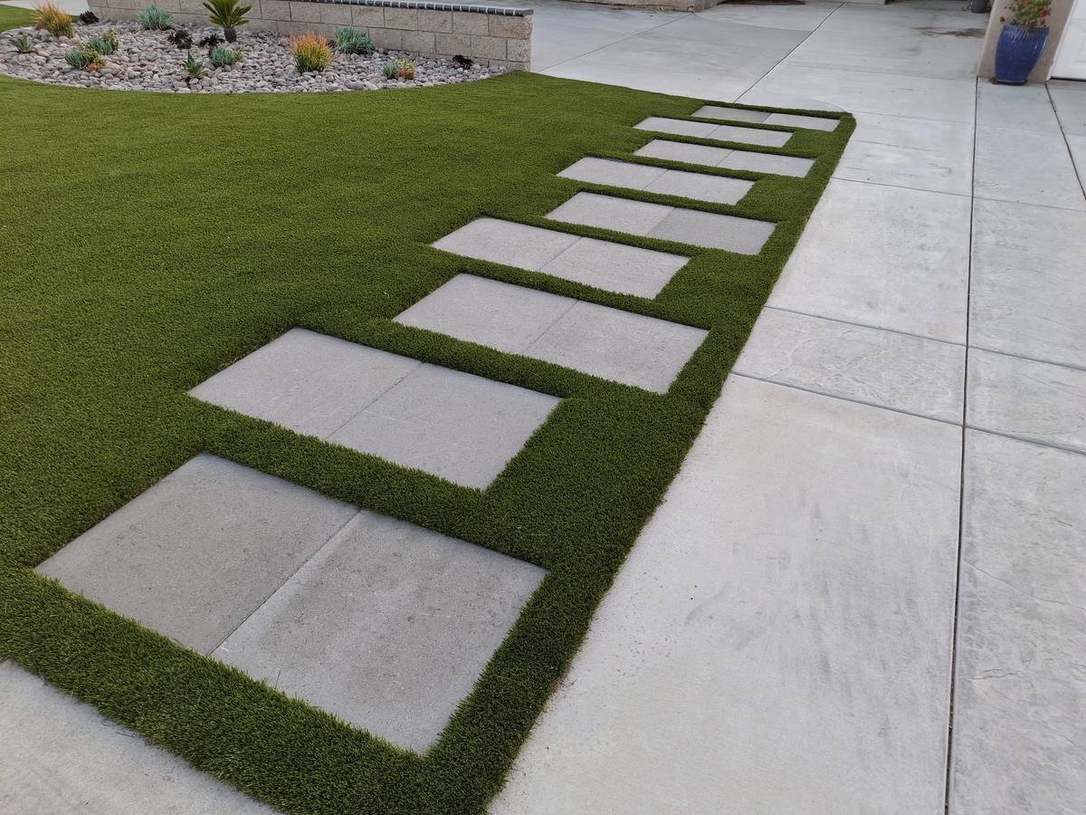 Front yard with diagonal stepping pads, installed by Synthetic Grass Techs in Loma Linda