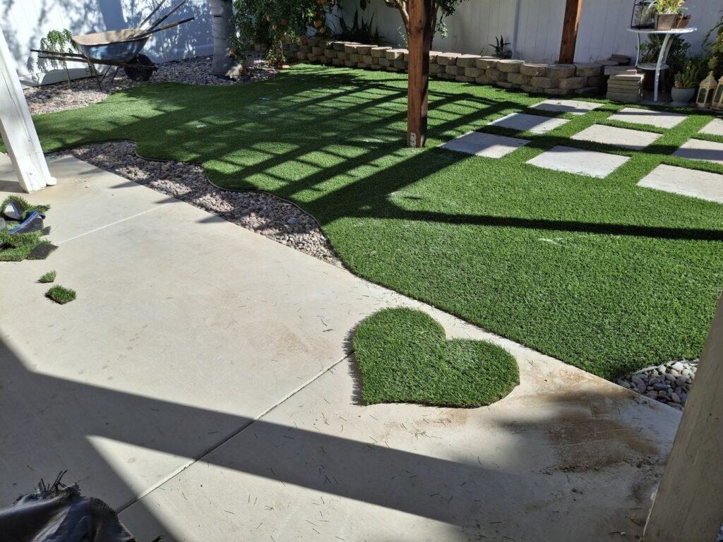 Pergola shade over artificial grass and stepping pads