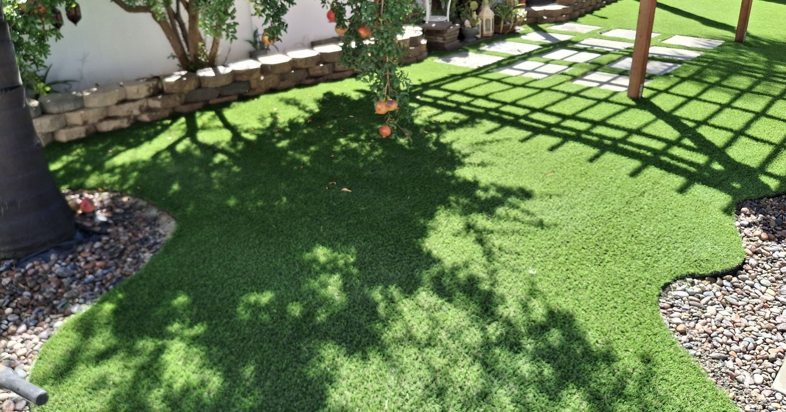 Finished backyard artificial grass installation